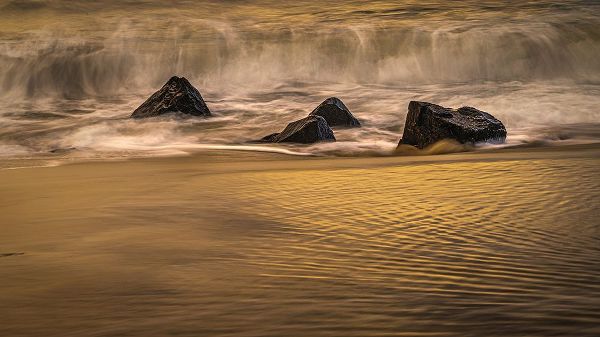 Jaynes Gallery 아티스트의 USA-New Jersey-Cape May National Seashore-Sunrise on shore rocks and wave작품입니다.
